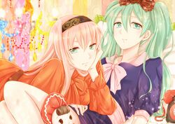  2girls daichi_saya green_eyes green_hair hatsune_miku long_hair megurine_luka multiple_girls phone pink_hair twintails vocaloid 