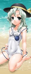  1girl beach blush bow byeontae_jagga green_eyes green_hair hat highres komeiji_koishi name_tag ocean school_swimsuit sitting smile solo swimsuit third_eye touhou wariza water white_school_swimsuit 