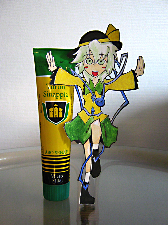 1girl blush_stickers green_eyes green_hair hat komeiji_koishi mustard outstretched_arms papercraft photo ribbon setz short_hair skirt smile solo standing_on_one_leg touhou