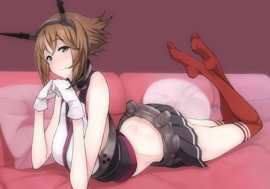 1girl amayu belt breasts brown_hair gloves green_eyes headgear kantai_collection looking_at_viewer lying mutsu_(kantai_collection) personification pillow red_legwear short_hair skirt smile solo thighhighs white_gloves