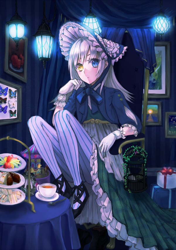 1girl blue_eyes blush bonnet cup dress gift gloves hat heterochromia long_hair original pastry silver_hair sitting solo striped striped_legwear tea teacup vertical-striped_legwear vertical_stripes white_gloves yellow_eyes