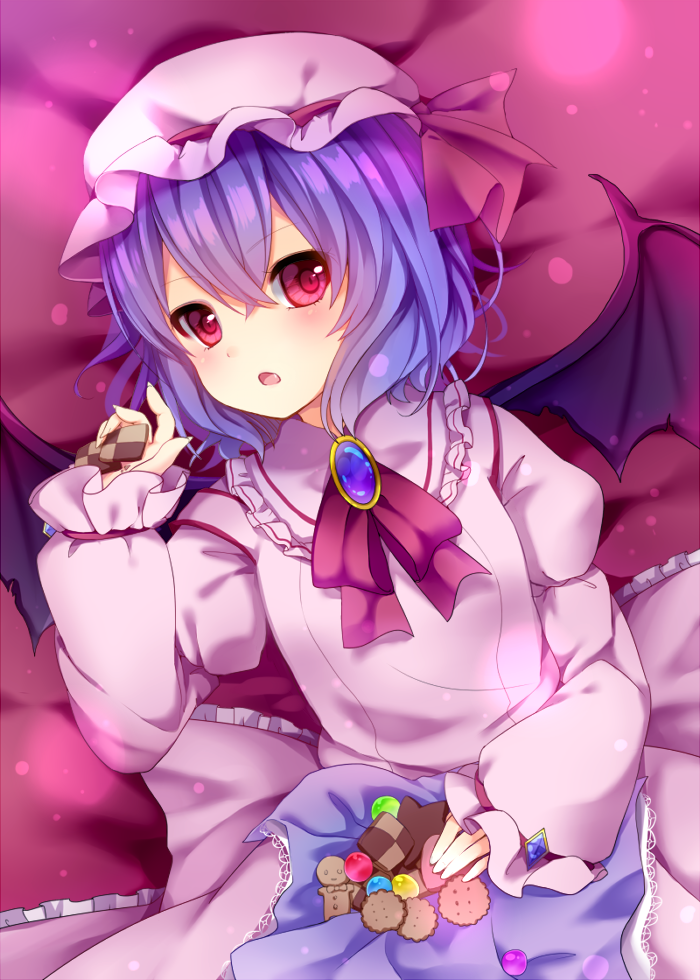 1girl bat_wings bed_sheet blue_hair cookie food holding looking_at_viewer lying mob_cap nachi open_mouth red_eyes remilia_scarlet short_hair solo touhou wings