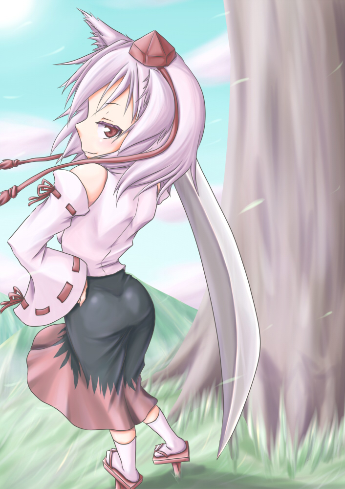 1girl animal_ears ass bare_shoulders detached_sleeves geta hand_on_hip hat inubashiri_momiji kounotsuki_yuu looking_at_viewer looking_back nature over_shoulder pom_pom_(clothes) red_eyes ribbon-trimmed_sleeves ribbon_trim short_hair silver_hair smile solo sword sword_over_shoulder tokin_hat touhou tree weapon weapon_over_shoulder wolf_ears