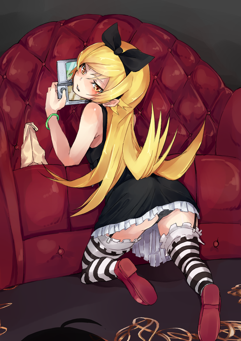 1girl ass bag bakemonogatari blonde_hair couch from_behind gothic_lolita lolita_fashion long_hair monogatari_(series) nintendo_ds oshino_shinobu striped striped_legwear yellow_eyes