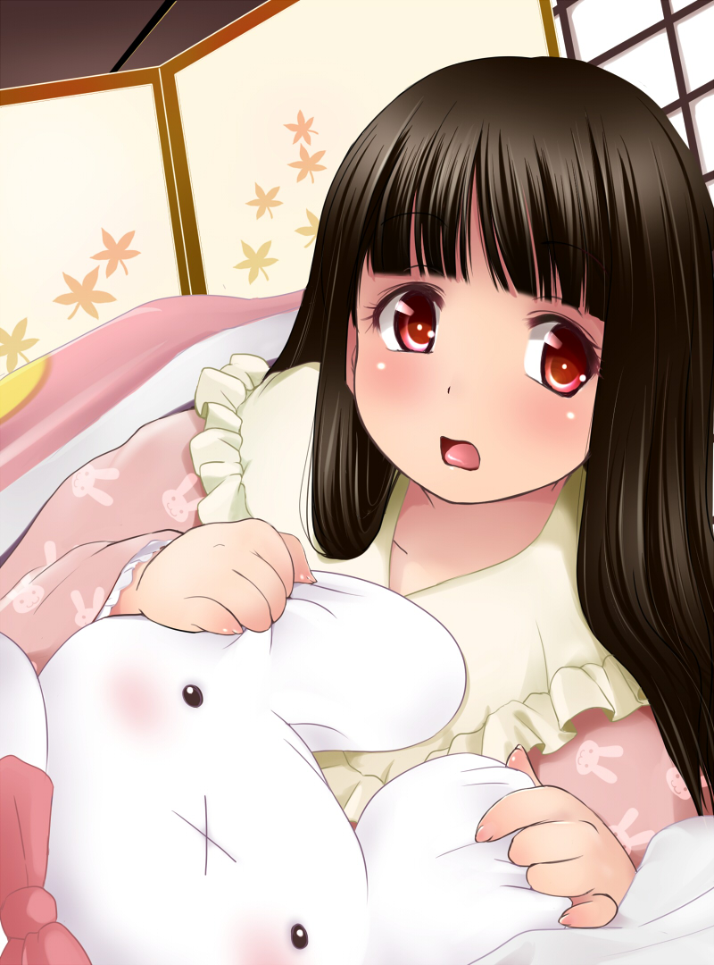 1girl :x black_hair blush brown_eyes bunny_print commentary_request futon hime_cut houraisan_kaguya kozue_akari long_sleeves looking_at_viewer open_mouth pajamas red_eyes solo stuffed_animal stuffed_bunny stuffed_toy touhou under_blanket