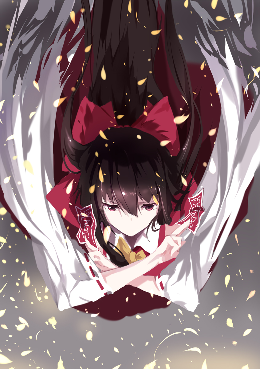 1girl ascot between_fingers black_hair bow detached_sleeves from_above hair_bow hair_tubes hakurei_reimu highres light long_hair long_sleeves looking_ahead no_mouth petals red_eyes red_skirt ribbon-trimmed_sleeves ribbon_trim serious shiny shiny_hair skirt sleeveless solo talismans touhou wide_sleeves wind ziran_juan