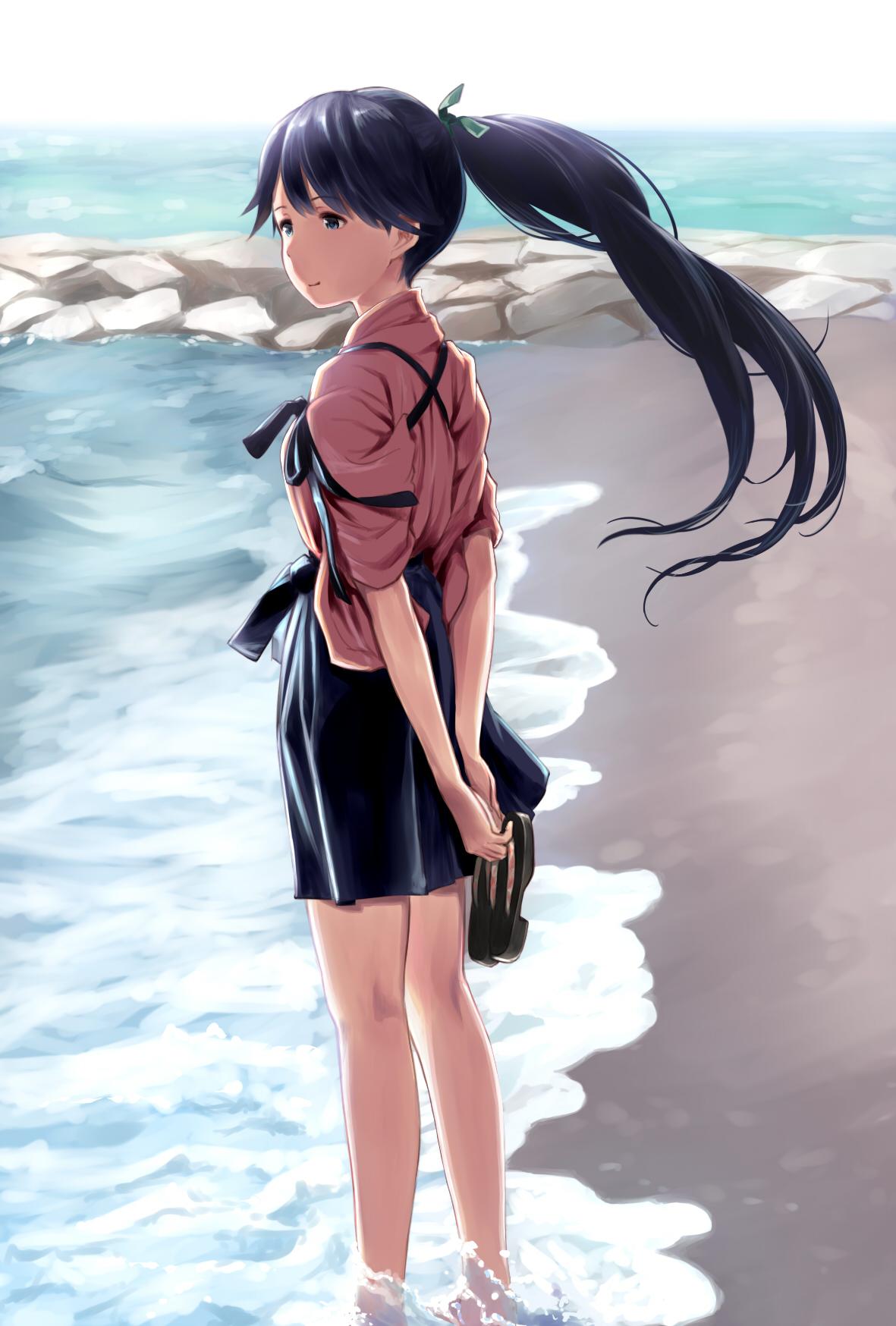 1girl beach black_hair feet_in_water from_side highres houshou_(kantai_collection) japanese_clothes kantai_collection long_hair ponytail shoes_removed smile soaking_feet solo tasuki wa_(genryusui) water