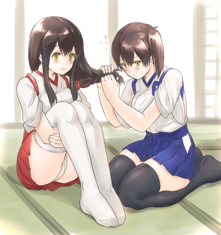 2girls adjusting_another's_hair adjusting_hair akagi_(kantai_collection) black_legwear blue_skirt blush braiding_hair brown_eyes brown_hair flying_sweatdrops fukuroumori fundoshi hairdressing japanese_clothes kaga_(kantai_collection) kantai_collection knees_up long_hair multiple_girls red_skirt seiza side_ponytail sitting skirt tatami white_legwear