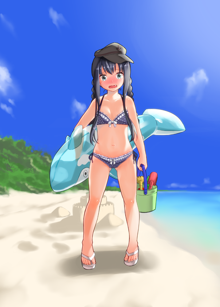 1girl akatsuki_(kantai_collection) alternate_eye_color alternate_hairstyle anchor_symbol aqua_eyes bare_shoulders barefoot_sandals beach bikini black_hair blue_sky blush braid bucket clouds fang flat_cap hat inflatable_dolphin inflatable_toy kantai_collection long_hair looking_at_viewer navel open_mouth outdoors rake remodel_(kantai_collection) sand sand_castle sand_sculpture shinkun shovel side-tie_bikini sky solo standing swimsuit twin_braids twintails water worktool