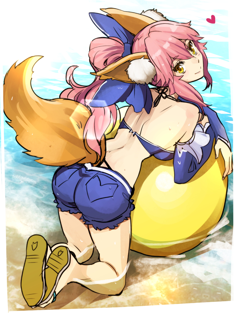 1girl animal_ears ball beach beachball bikini_top bow caster_(fate/extra) fate/grand_order fate_(series) fox_ears fox_tail hair_bow looking_at_viewer pink_hair ponytail shimo_(s_kaminaka) shorts smile solo tail water yellow_eyes