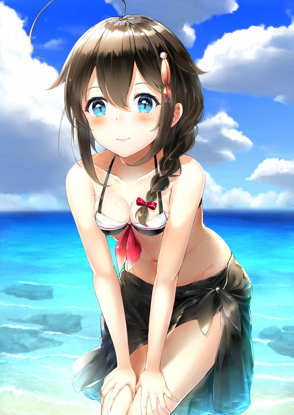 1girl adapted_costume ahoge beach bikini black_bikini black_hair blue_eyes blue_sky blush bow braid breasts cleavage closed_mouth eyelashes groin hair_bow hair_flaps hair_ornament hair_over_shoulder hands_on_own_thighs highres kantai_collection leaning_forward looking_at_viewer navel ocean outdoors red_bow rock sarong shigure_(kantai_collection) shore single_braid sky small_breasts smile solo somalisu standing stomach summer swimsuit
