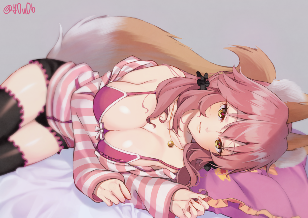 1girl animal_ears black_legwear bra breasts cleavage fate/extra fate_(series) fox_ears fox_tail grey_background jewelry large_breasts long_hair long_sleeves looking_at_viewer lying necklace off_shoulder on_side pillow pink_bra pink_hair simple_background smile solo striped striped_sweater sweater tail tamamo_(fate)_(all) tamamo_no_mae_(fate) thigh-highs underwear yellow_eyes you06