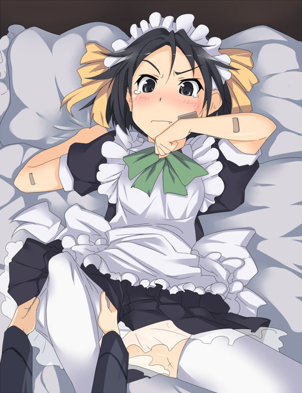 1girl apron bandaid bandaid_on_face black_eyes black_hair blush brave_witches fang kanno_naoe kuronyan lying maid maid_apron maid_headdress pillow short_hair strike_witches tears thigh-highs undressing white_legwear world_witches_series