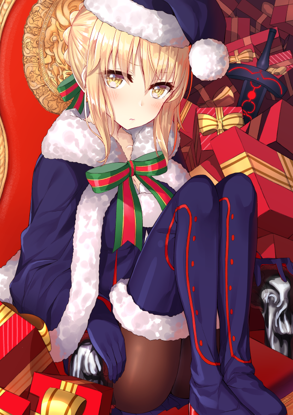 1girl ass black_legwear blonde_hair blue_gloves blush boots box braid capelet chair fate/grand_order fate_(series) fur_trim gift gift_box gloves hakuishi_aoi hat knees_up long_sleeves looking_at_viewer pantyhose pom_pom_(clothes) ribbon saber saber_alter santa_alter santa_costume santa_hat short_hair sidelocks sitting solo sword thigh-highs thigh_boots weapon yellow_eyes