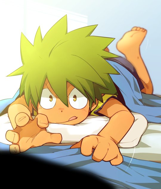 1boy :p barefoot bed_sheet green_hair kameyama_tokusa lying male_focus on_stomach outstretched_hand pillow sheet_grab solo tan tenkai_knights tongue tongue_out yellow_eyes