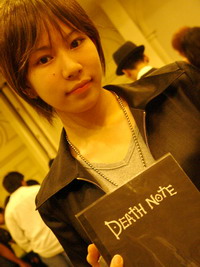 cosplay death_note l_(death_note) lowres photo solo_focus yagami_light
