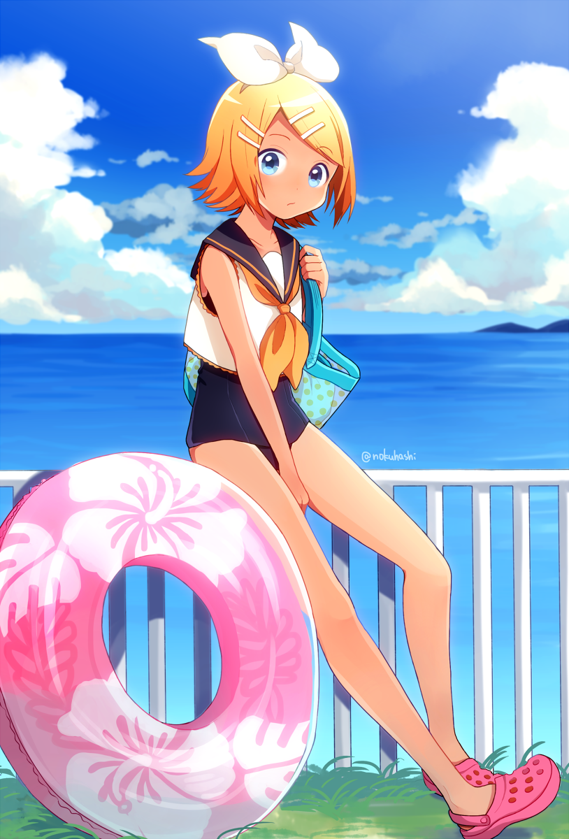 1girl bag blonde_hair blue_eyes blue_sky bow clouds crocs day fence full_body grass hair_ornament hairclip handbag highres horizon inflatable_toy kagamine_rin leaning_against_railing legs looking_at_viewer nokuhashi ocean outdoors railing sailor_collar sandals school_swimsuit short_hair sky solo swimsuit swimsuit_under_clothes tan vocaloid water