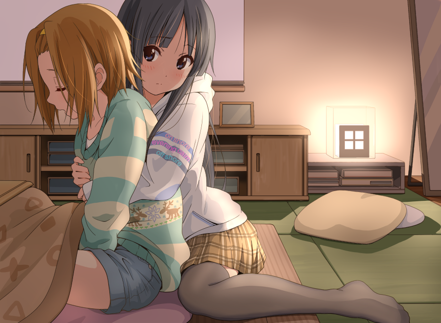 2girls akiyama_mio alternate_costume between_legs black_eyes black_hair blush breast_grab brown_hair casual denim denim_shorts dresstrip engrish grabbing hairband hand_between_legs hood hoodie hug hug_from_behind indoors k-on! kotatsu lamp long_hair multiple_girls night open_mouth pillow plaid plaid_skirt ranguage reindeer shadow short_hair shorts sitting skirt snowflake_print sweater table tainaka_ritsu tatami wariza yuri