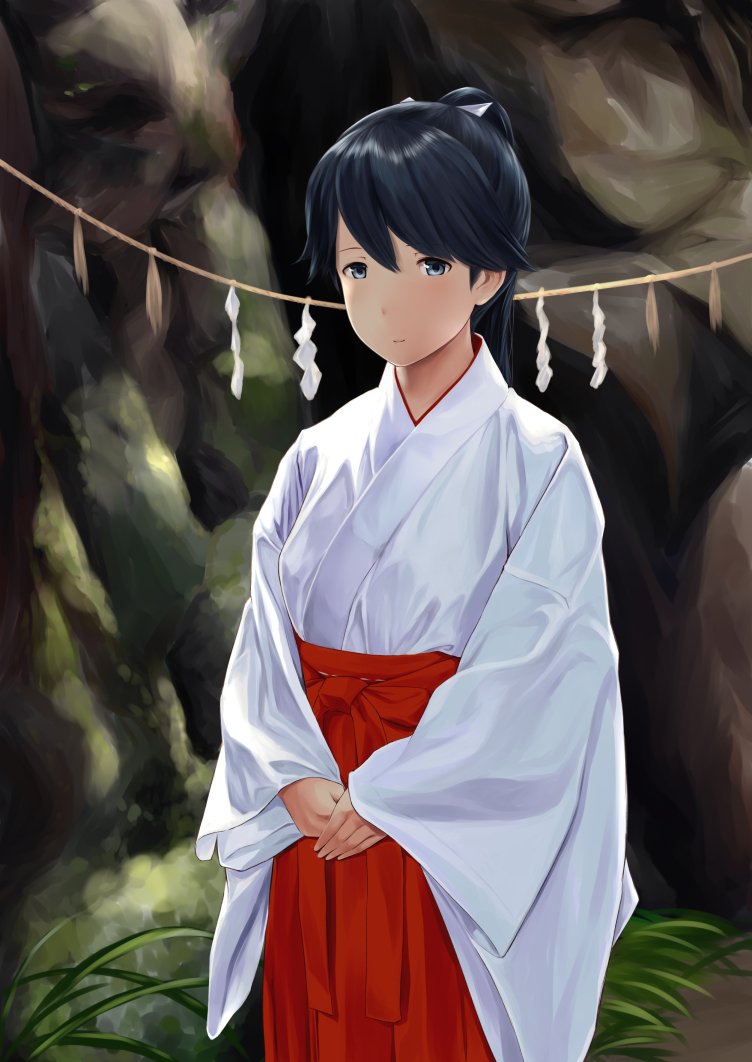 1girl black_hair commentary grey_eyes hair_ribbon hakama hands_together houshou_(kantai_collection) japanese_clothes kantai_collection long_sleeves looking_at_viewer miko ponytail red_hakama ribbon rock rope shide shimenawa smile solo standing sunlight v_arms wa_(genryusui) wide_sleeves