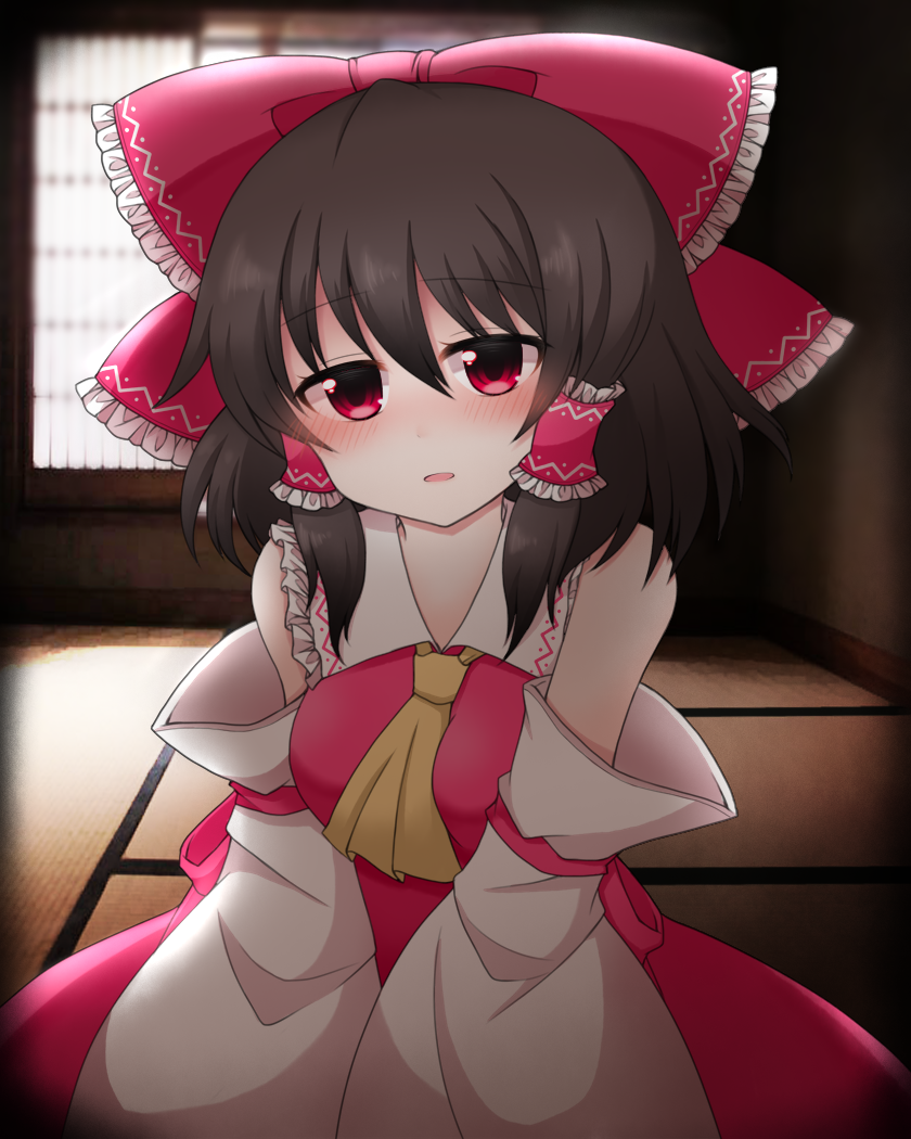 1girl ascot bare_shoulders between_breasts blush bow breasts brown_hair commentary_request detached_sleeves hair_bow hair_tubes hakurei_reimu hakurei_shrine head_tilt indoors large_bow looking_at_viewer medium_breasts open_mouth red_eyes shiohachi short_hair solo touhou v_arms