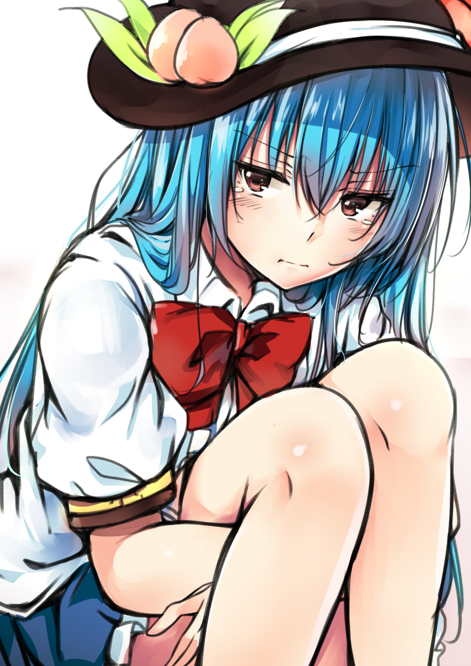 1girl :i black_hat blue_hair blue_skirt bow bowtie brown_eyes collared_shirt food frilled_skirt frills frown fruit hair_between_eyes hands_under_legs hat hat_leaf highres hinanawi_tenshi knees leg_hug long_hair looking_at_viewer peach pout puffy_short_sleeves puffy_sleeves red_bow red_bowtie shirt short_sleeves skirt solo tearing_up touhou white_background white_shirt yuhito_(ablbex)