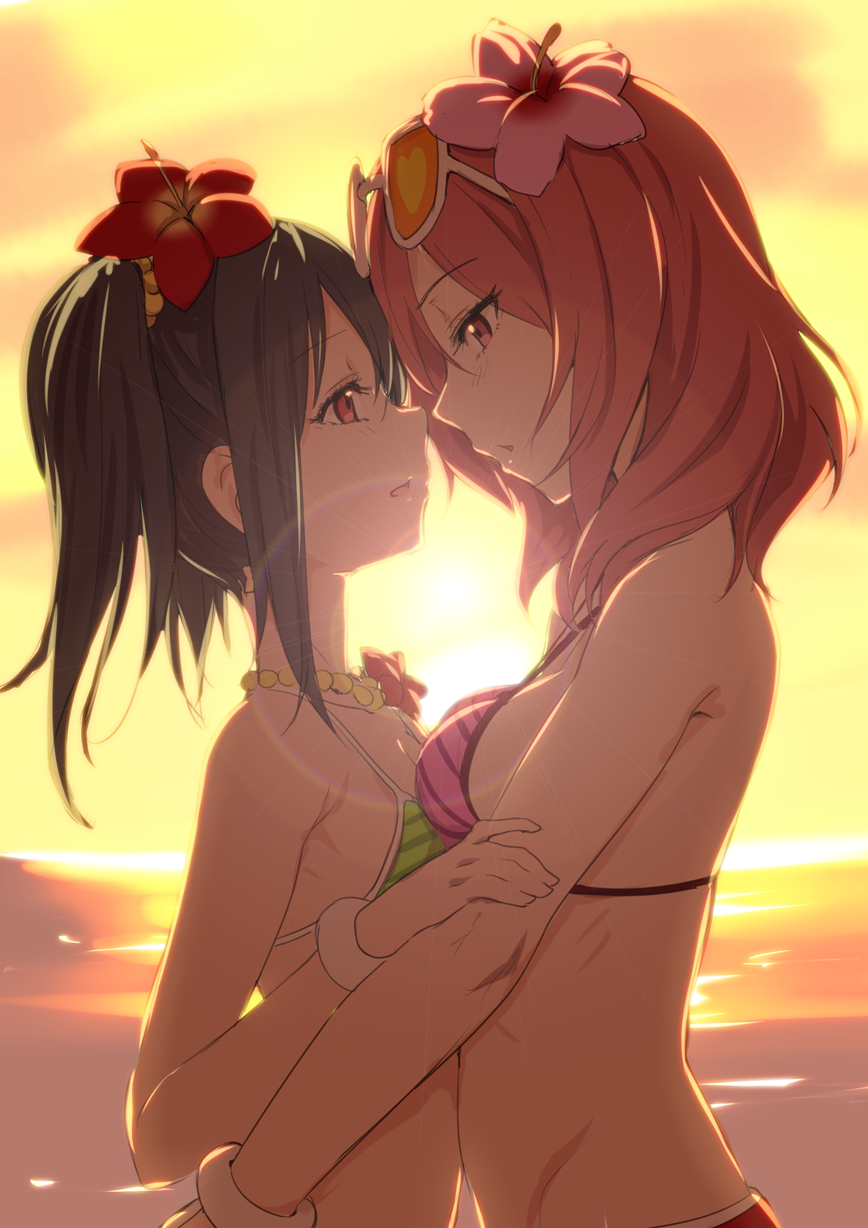 2girls backlighting beach bikini black_hair blush bracelet clearite commentary_request eye_contact flower hair_flower hair_ornament hibiscus highres hug incipient_kiss jewelry looking_at_another love_live! love_live!_school_idol_project multiple_girls natsuiro_egao_de_1_2_jump! necklace nishikino_maki ocean open_mouth red_eyes redhead short_hair sunglasses sunglasses_on_head sunset swimsuit twintails violet_eyes water yazawa_nico yuri