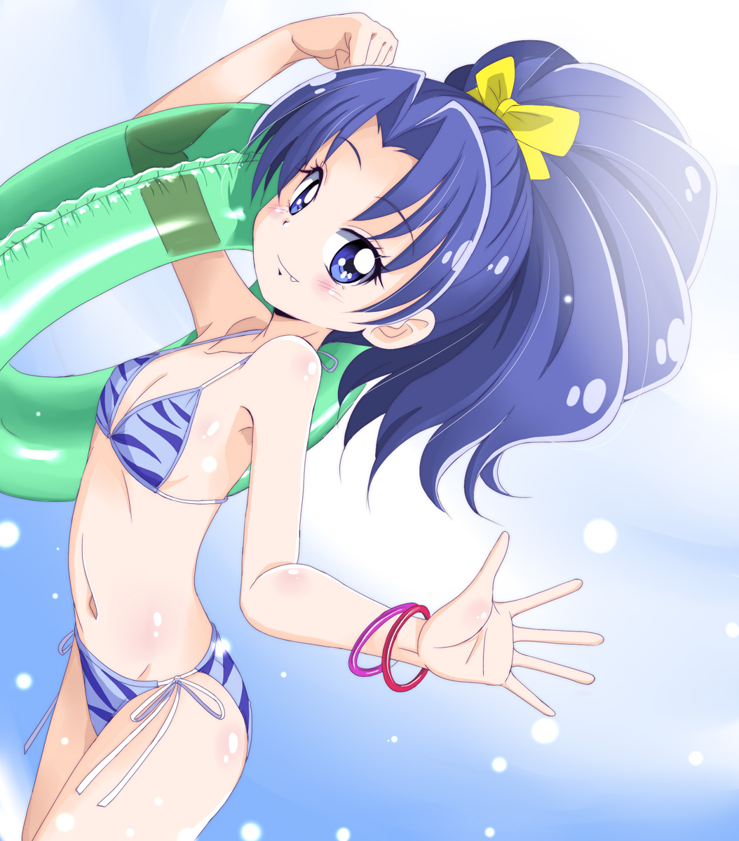 1girl amraam120c bikini blue_bikini blue_eyes blue_hair bracelet cowboy_shot fang flat_chest hair_ribbon high_ponytail highres innertube jewelry kirakira_precure_a_la_mode long_hair looking_at_viewer ponytail precure ribbon side-tie_bikini solo standing swimsuit tategami_aoi yellow_ribbon