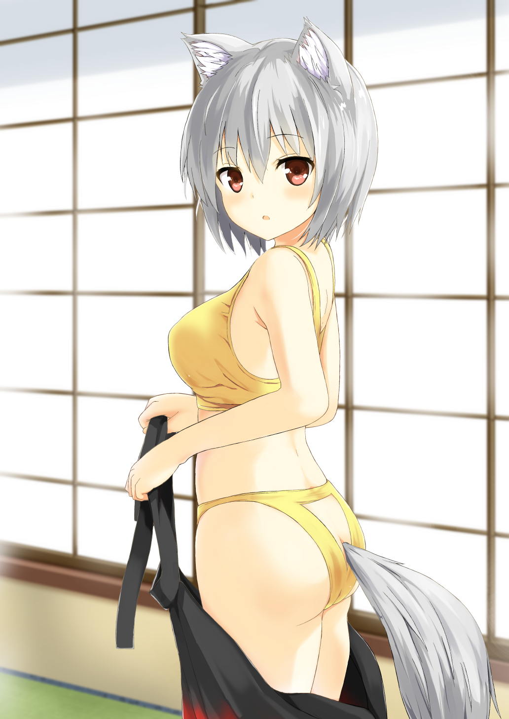 1girl animal_ears bangs bare_arms bare_shoulders black_skirt bluekalmia blush bra cowboy_shot from_side highres indoors inubashiri_momiji looking_at_viewer looking_to_the_side panties parted_lips red_eyes short_hair silver_hair skirt solo tail touhou underwear undressing wolf_ears wolf_tail yellow_bra yellow_panties
