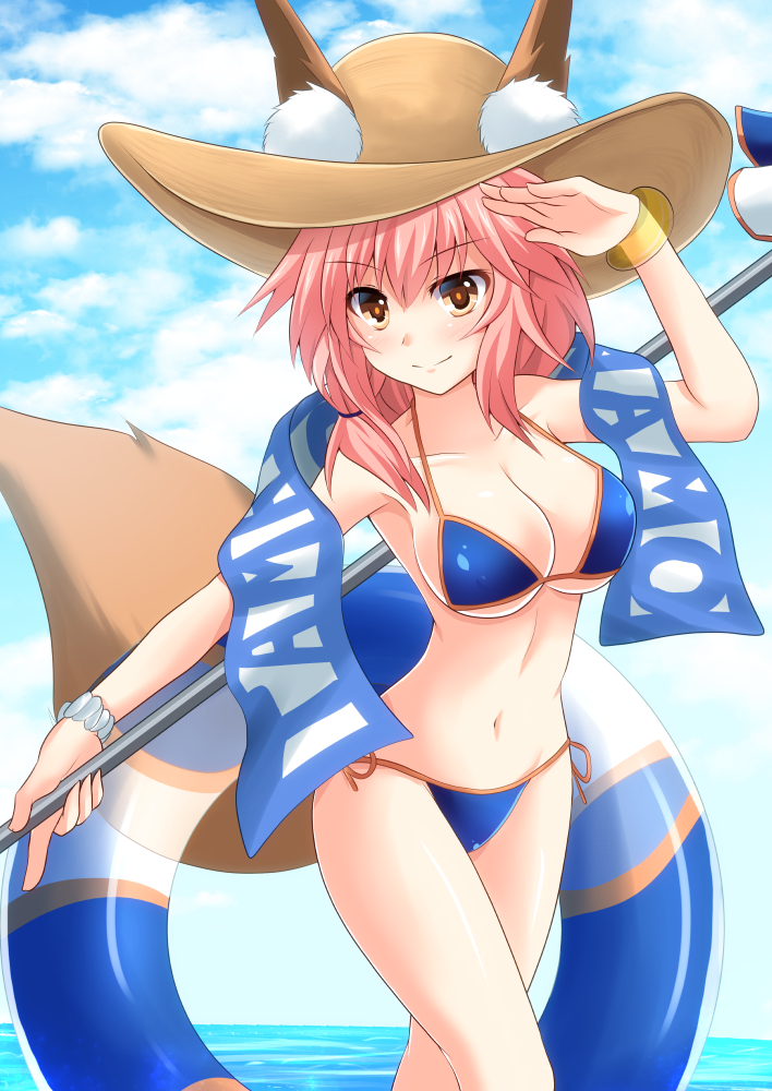 1girl animal_ears bikini blue_bikini breasts cross_(crossryou) fate/grand_order fate_(series) fox_ears fox_tail hat large_breasts legs_crossed long_hair looking_at_viewer navel pink_hair solo standing swimsuit tail tamamo_(fate)_(all) tamamo_no_mae_(swimsuit_lancer)_(fate) umbrella water yellow_eyes