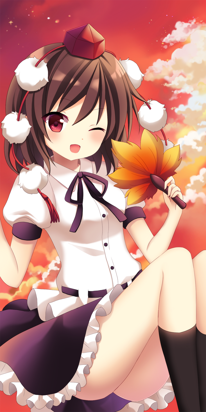 1girl ;d bangs black_skirt blush brown_hair clouds cloudy_sky eyebrows_visible_through_hair fan frills hands_up hat highres holding holding_fan looking_at_viewer mayo_(miyusa) one_eye_closed open_mouth outdoors puffy_short_sleeves puffy_sleeves red_eyes red_sky shameimaru_aya short_sleeves skirt sky smile solo tokin_hat touhou
