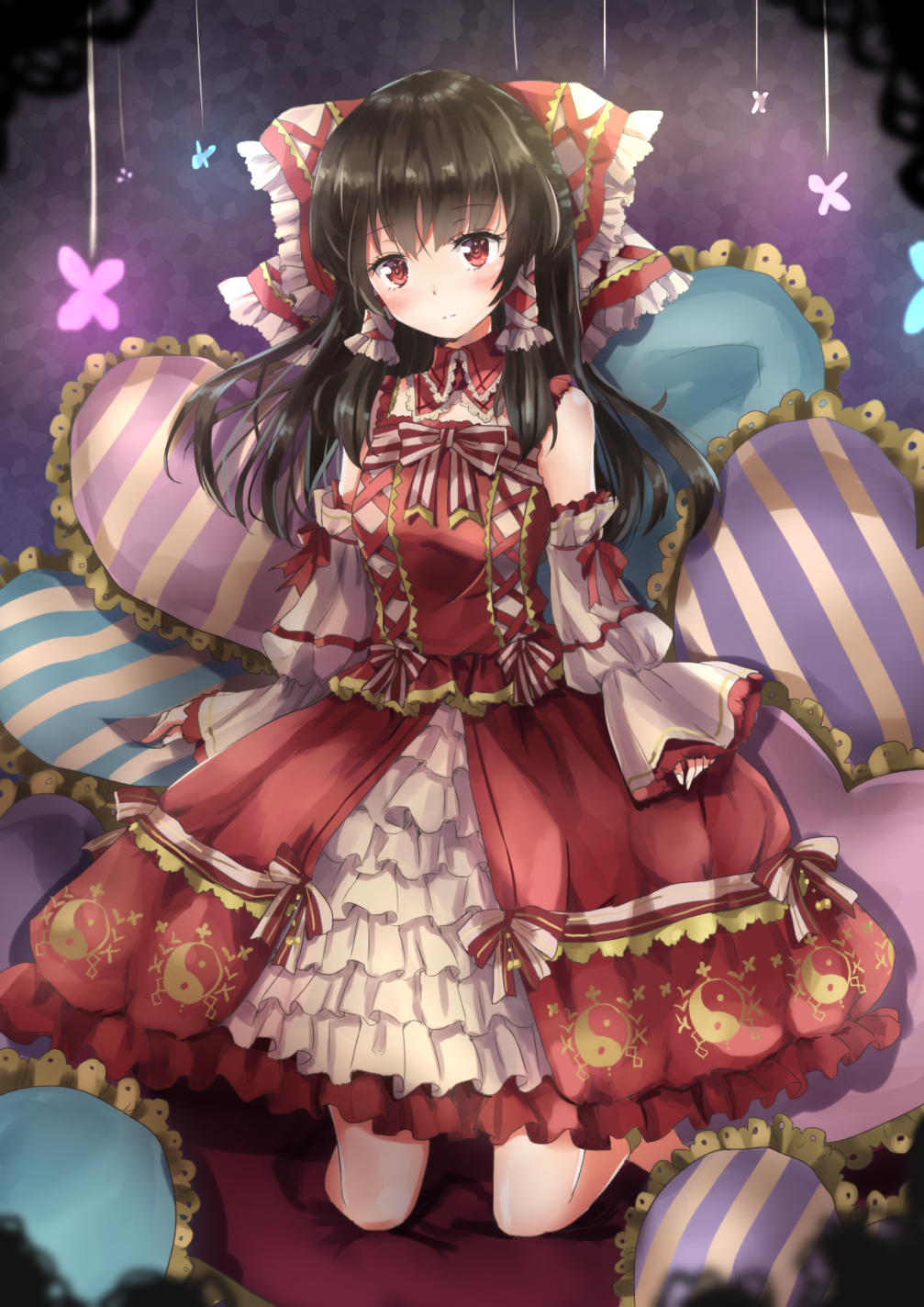1girl adapted_costume bangs black_hair bow dress embellished_costume frilled_dress frills full_body hair_bow hair_tubes hakurei_reimu heart heart_pillow highres kneehighs kneeling looking_at_viewer pillow red_bow red_dress red_eyes shironeko_yuuki sleeves_past_wrists solo striped_pillow touhou yin_yang