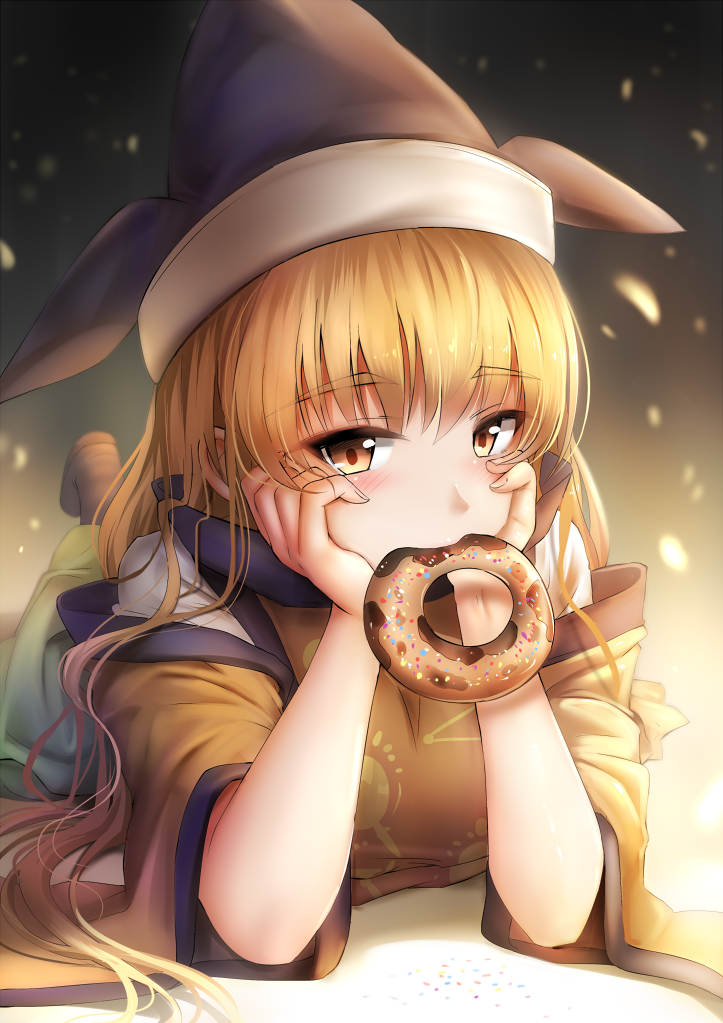 1girl arm_support bangs blonde_hair blurry blush boots brown_boots brown_hat depth_of_field detached_sleeves doughnut eyebrows_visible_through_hair food food_in_mouth foreshortening full_body ginhaha green_skirt hands_on_own_cheeks hands_on_own_face hat knee_boots leg_up light_particles long_hair long_skirt long_sleeves looking_at_viewer lying matara_okina mouth_hold on_stomach skirt solo tabard touhou tsurime wide_sleeves yellow_eyes