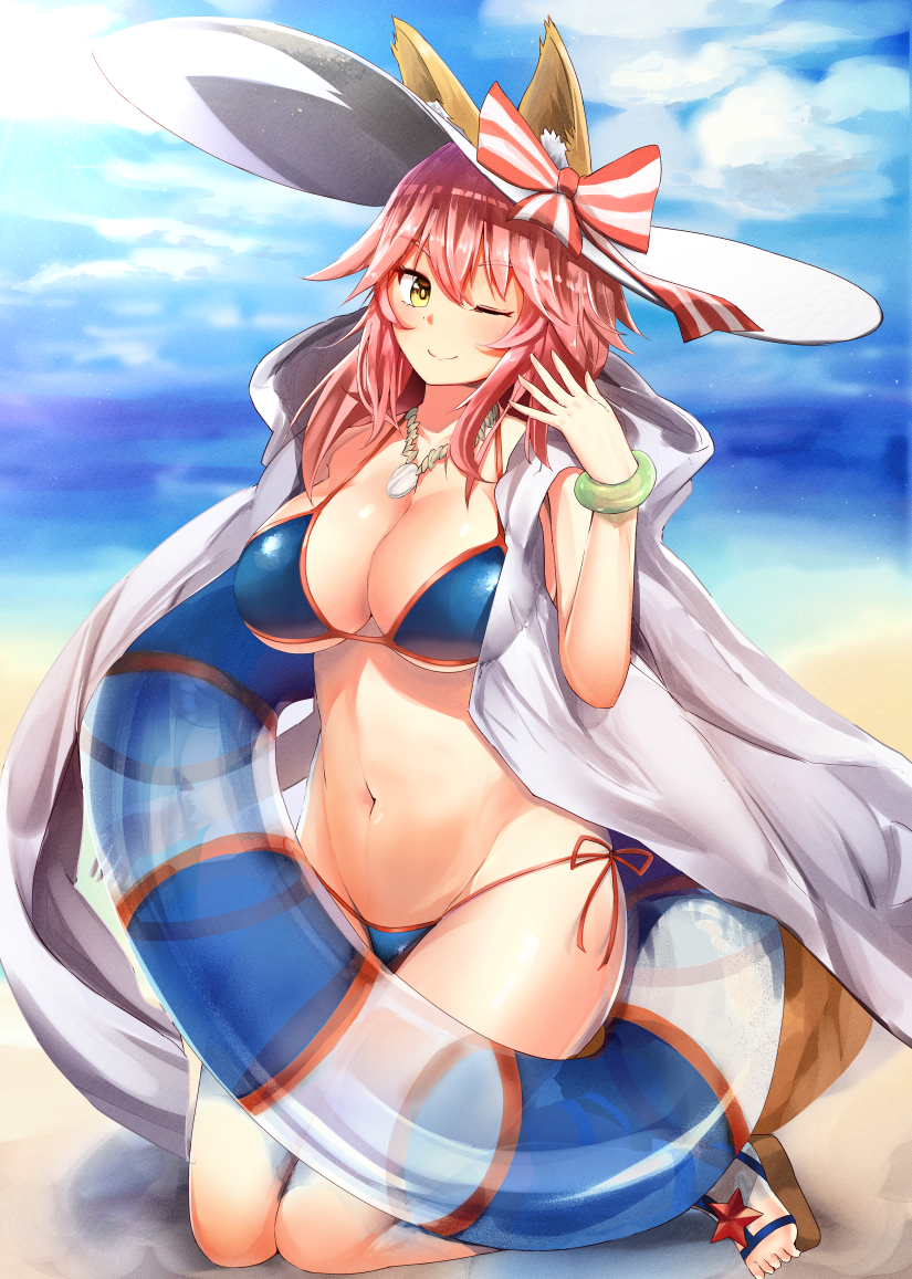 1girl animal_ears beach bikini blue_bikini blush breasts cleavage day ears_through_headwear fate/extra fate/grand_order fate_(series) fox_ears fox_tail hat innertube large_breasts light_smile long_hair looking_at_viewer nanasumin navel ocean one_eye_closed outdoors pink_hair solo swimsuit tail tamamo_(fate)_(all) tamamo_no_mae_(swimsuit_lancer)_(fate) yellow_eyes