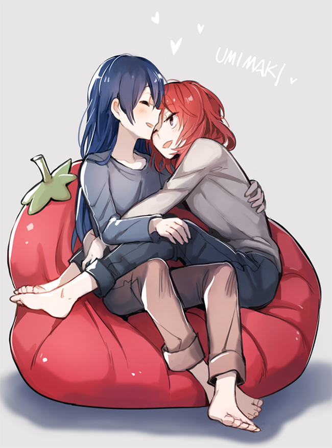 2girls ;d barefoot black_pants blue_hair blue_sweater blush character_name cushion eyebrows_visible_through_hair full_body grey_background grey_sweater hand_on_another's_back hand_on_another's_knee heart kuma_(bloodycolor) long_hair long_sleeves love_live! love_live!_school_idol_project multiple_girls nishikino_maki one_eye_closed open_mouth pants profile redhead shiny shiny_hair short_hair sideways_mouth simple_background sitting smile sonoda_umi sweater violet_eyes yuri