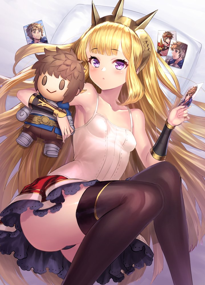 1girl black_legwear blonde_hair blush bracer breasts cagliostro_(granblue_fantasy) camisole character_doll eyebrows_visible_through_hair gran_(granblue_fantasy) granblue_fantasy knees_together_feet_apart long_hair looking_at_viewer lying photo_(object) skirt small_breasts solo thigh-highs tiara very_long_hair violet_eyes yapo_(croquis_side)