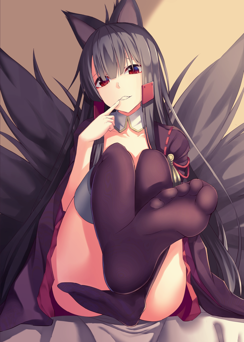 1girl akagi_(azur_lane) animal_ears azur_lane black_hair convenient_leg finger_to_mouth fox_tail hcci_pcci highres long_hair looking_at_viewer red_eyes red_skirt sitting skirt soles solo tail thigh-highs