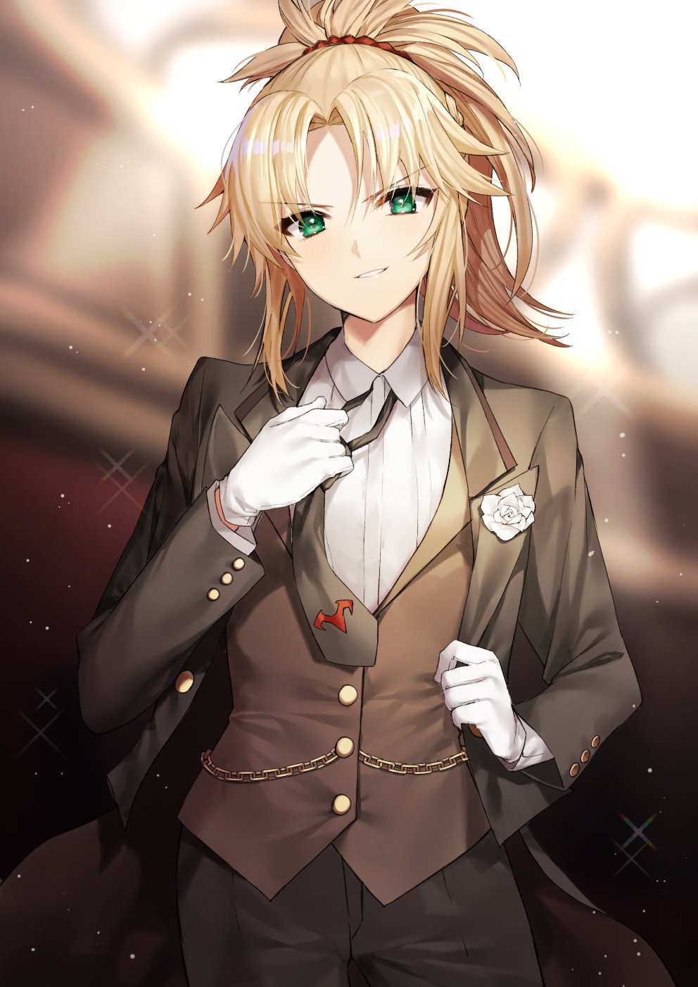 1girl bangs blonde_hair blurry blurry_background blush brown_jacket brown_neckwear brown_vest chains collared_shirt commentary cowboy_shot depth_of_field eyebrows_visible_through_hair fate/grand_order fate_(series) flower gambe gloves green_eyes grey_pants grin hair_ornament hair_scrunchie hand_up highres jacket light_particles looking_at_viewer mordred_(fate) mordred_(fate)_(all) necktie neckwear_grab open_clothes open_jacket pants parted_bangs parted_lips ponytail scrunchie shirt smile solo standing v-shaped_eyebrows vest white_flower white_gloves wing_collar