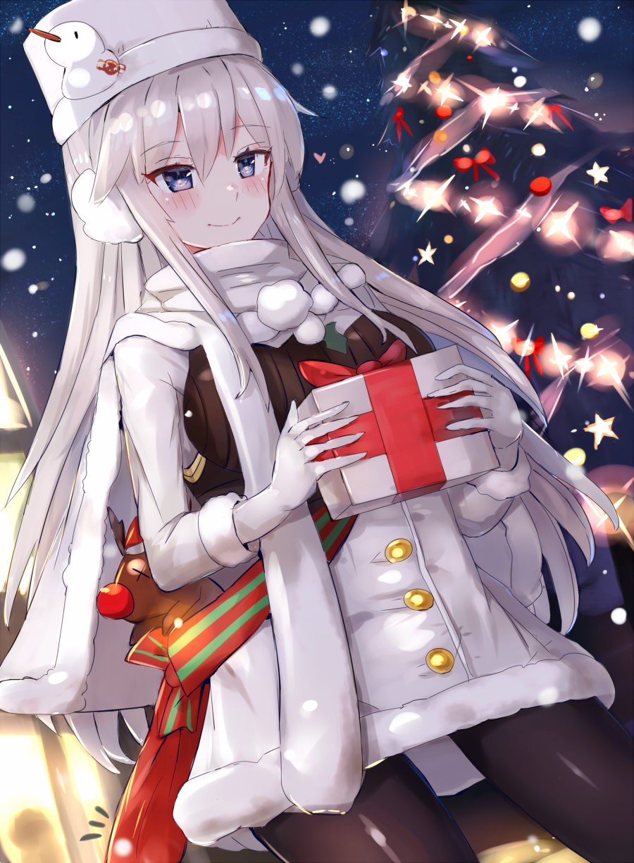 1girl azur_lane black_legwear blue_eyes box christmas_tree cowboy_shot dutch_angle earmuffs enterprise_(azur_lane) enterprise_(reindeer_master)_(azur_lane) eyebrows_visible_through_hair from_below gift gift_box gloves hair_between_eyes hat highres holding holding_box long_hair night outdoors pantyhose silver_hair smile solo standing very_long_hair white_gloves white_hat winter_clothes xenonstriker