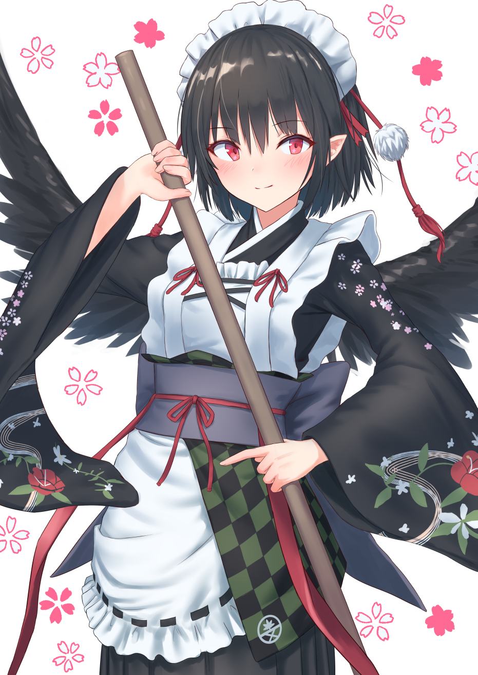 1girl alternate_costume apron bangs black_hair black_kimono black_wings blush checkered commentary_request cowboy_shot enmaided eyebrows_visible_through_hair feathered_wings floral_print frilled_apron frills grey_sash hair_between_eyes highres holding japanese_clothes kimono long_sleeves looking_at_viewer maid maid_apron maid_headdress obi pointy_ears pom_pom_(clothes) red_eyes red_ribbon ribbon ribbon_trim roke_(taikodon) sash shameimaru_aya short_hair simple_background solo standing tassel touhou wa_maid waist_cape white_apron white_background wide_sleeves wings