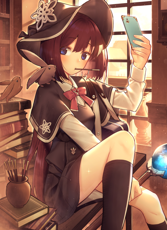 1girl black_legwear black_skirt blue_eyes bob_cut book_stack brown_hair capelet cellphone closed_mouth food hat holding holding_staff indoors knee_up kneehighs long_sleeves looking_at_viewer miniskirt nagareboshi original phone pocky self_shot short_hair skirt smartphone solo staff witch witch_hat