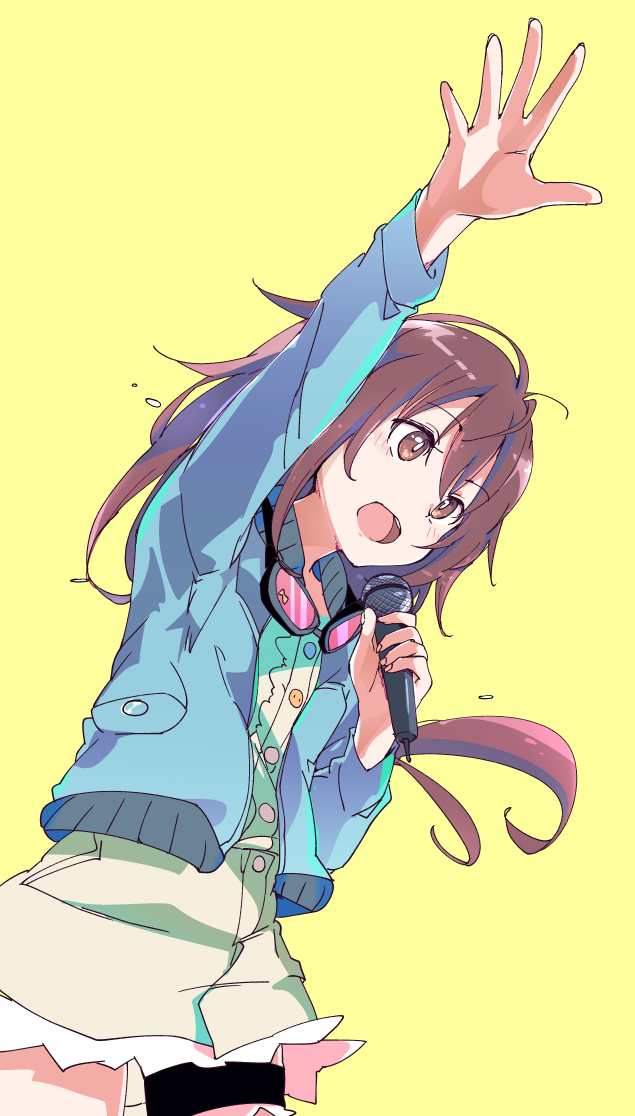 1girl arm_up brown_eyes brown_hair buttons cowboy_shot dress dutch_angle goggles goggles_around_neck ixy jacket long_hair microphone moritomo_nozomi open_mouth short_dress simple_background solo the_rolling_girls thigh_strap yellow_background