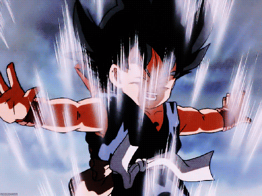 1boy animated animated_gif aura black_eyes black_hair dougi dragon_ball fighting_stance full_body male_focus nyoibo outstretched_arms screencap short_hair son_gokuu spiky_hair spinning standing tail