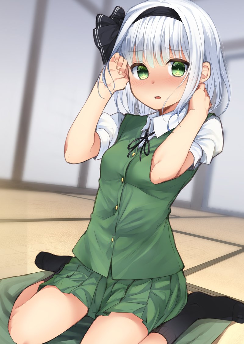 1girl black_hair black_legwear black_ribbon blush breasts buttons fingernails green_eyes green_skirt hair_ribbon hands_up indoors konpaku_youmu looking_at_viewer miniskirt nigo_(aozoragarou) no_shoes nose_blush puffy_short_sleeves puffy_sleeves ribbon short_sleeves sitting skirt skirt_set small_breasts socks solo tatami touhou vest wariza white_hair