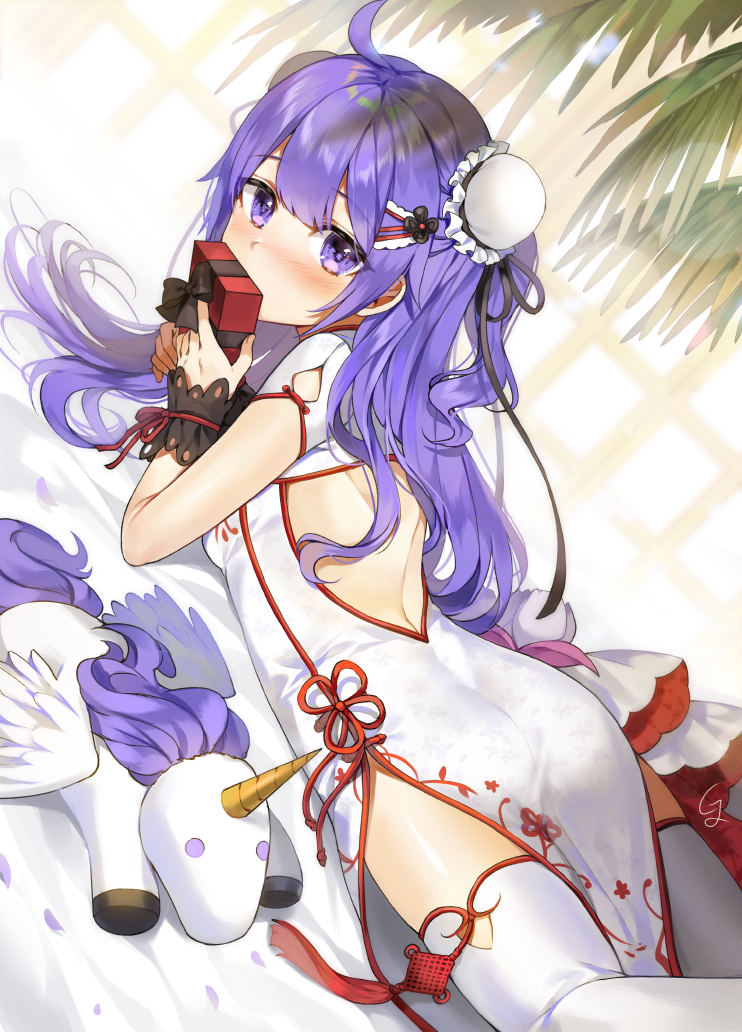 1girl ahoge ass azur_lane back_cutout bare_back bed_sheet box china_dress chinese_clothes commentary_request covering_mouth double_bun dress gift gift_box gijang hair_ornament holding long_hair looking_at_viewer lying on_stomach purple_hair solo stuffed_animal stuffed_pegasus stuffed_toy stuffed_unicorn thigh-highs unicorn_(azur_lane) violet_eyes white_legwear