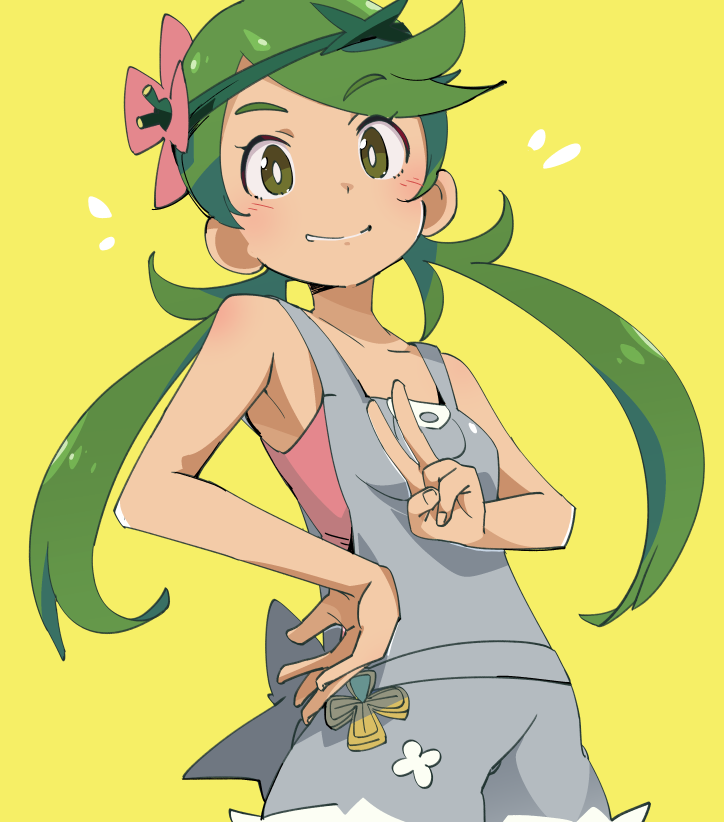 1girl apron bangs blush dark_skin eyebrows_visible_through_hair flower green_eyes green_hair hair_flower hair_ornament ixy looking_at_viewer low_twintails mallow_(pokemon) overalls pokemon pokemon_(game) pokemon_sm simple_background sleeveless smile solo swept_bangs twintails v yellow_background