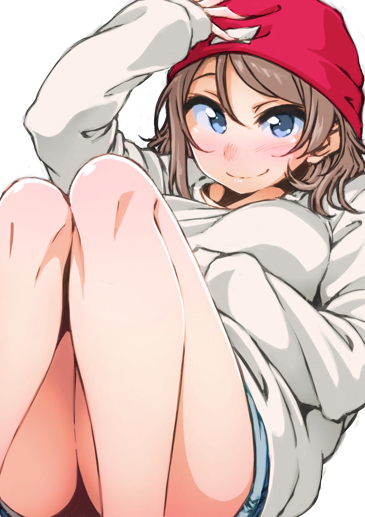 1girl ayumu-k beanie blue_eyes grey_hair hand_on_headwear hat highres knees_up long_sleeves looking_at_viewer love_live! love_live!_sunshine!! red_hat shirt short_hair short_shorts shorts simple_background sleeves_past_wrists smile solo sweatshirt watanabe_you white_background white_shirt