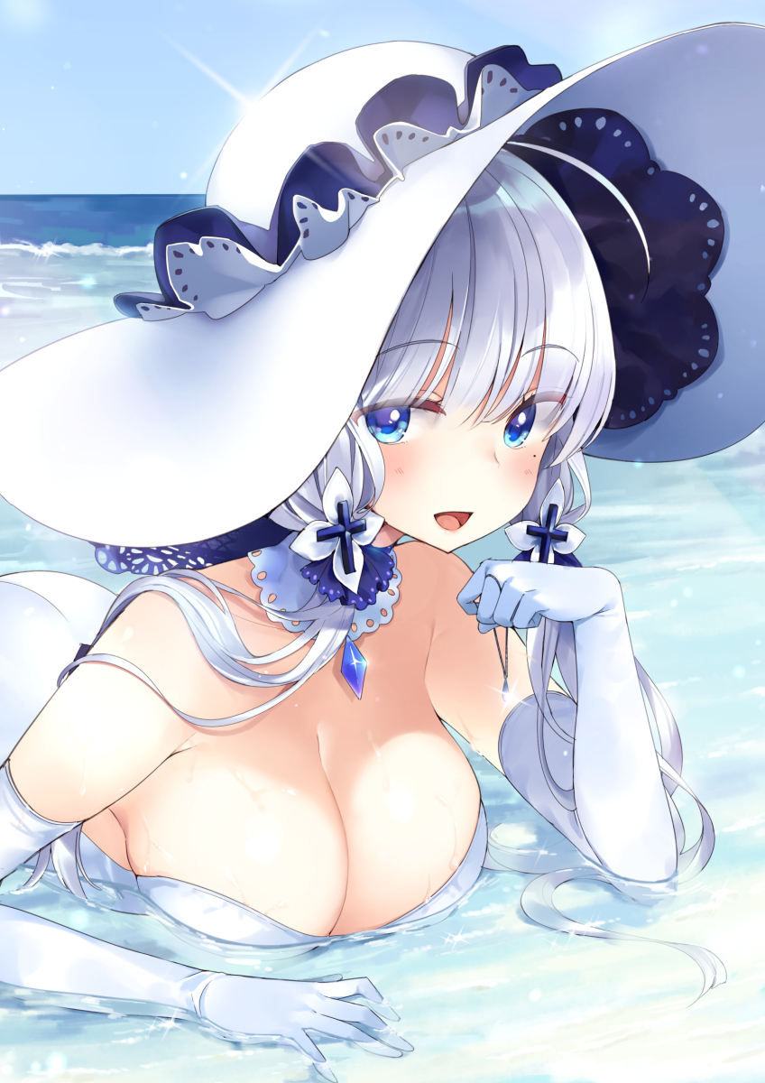 1girl ahoge azur_lane beach blue_eyes blue_sky blush breasts cleavage day detached_collar dress elbow_gloves eyebrows_visible_through_hair gloves hat highres illustrious_(azur_lane) large_breasts long_hair looking_at_viewer lying mirei mole mole_under_eye ocean on_stomach open_mouth silver_hair sky smile solo sunlight white_dress white_gloves white_hat