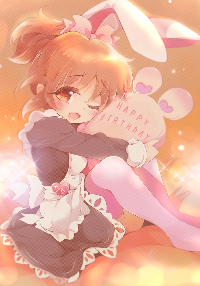 1girl abe_nana animal_ears apron black_dress blush bow brown_eyes brown_hair commentary_request dress eyebrows_visible_through_hair fake_animal_ears full_body hair_bow happy_birthday heart idolmaster idolmaster_cinderella_girls long_hair looking_at_viewer maid_apron no_shoes one_eye_closed open_mouth pillow pillow_hug pink_bow pink_legwear ponytail rabbit_ears sitting smile solo sparkle thigh-highs usoneko