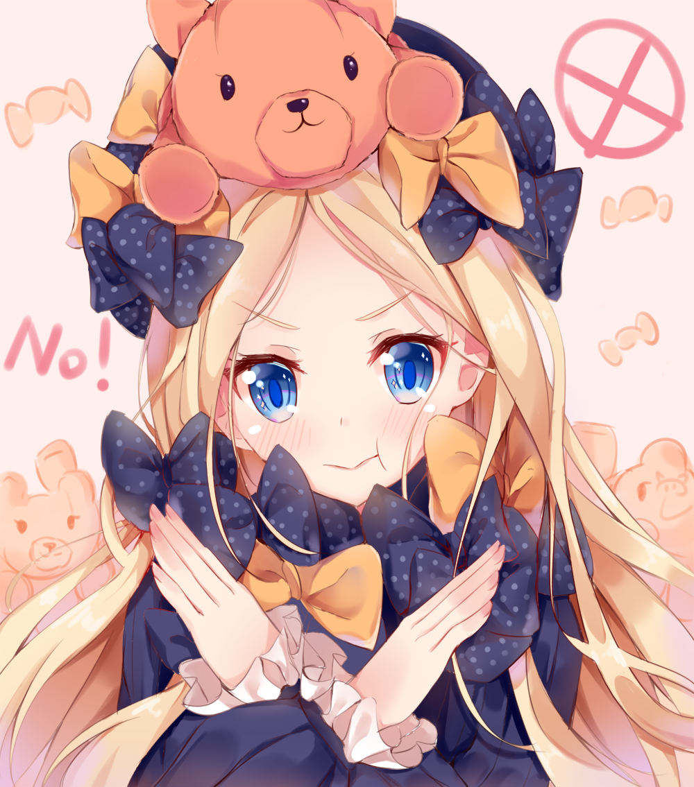 1girl :t abigail_williams_(fate/grand_order) bangs black_bow black_dress black_hat blonde_hair blue_eyes blush bow candy_wrapper closed_mouth commentary_request dress eyebrows_visible_through_hair fate/grand_order fate_(series) forehead hair_bow hands_up hat long_hair long_sleeves nahaki no on_head orange_bow parted_bangs polka_dot polka_dot_bow pout sleeves_past_wrists solo stuffed_animal stuffed_toy teddy_bear v-shaped_eyebrows very_long_hair x_arms