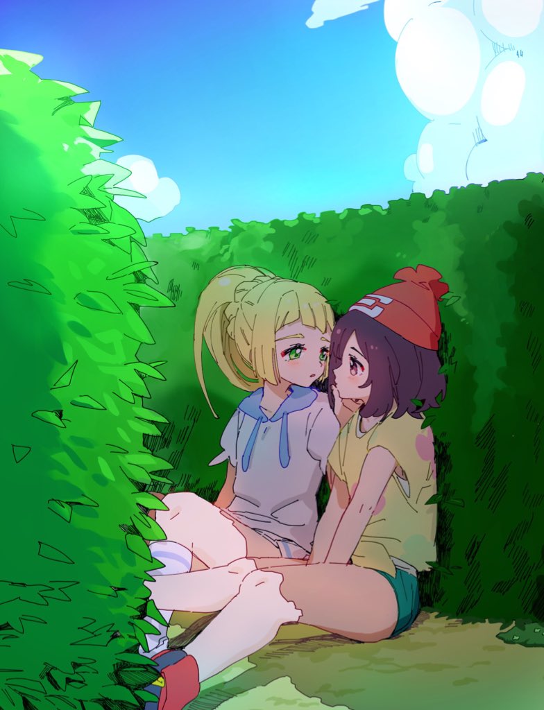 2girls ankea_(a-ramo-do) blonde_hair blue_sky blush brown_eyes brown_hair clouds green_eyes green_shorts hand_on_another's_face hat hedge_(plant) hood hoodie lillie_(pokemon) looking_at_another mizuki_(pokemon) multiple_girls open_mouth pokemon pokemon_(game) pokemon_sm ponytail red_hat shirt short_sleeves shorts sitting skirt sky white_skirt yellow_shirt yuri